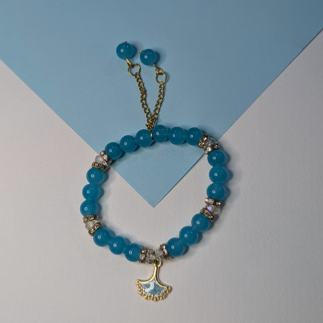 Elegant Aqua Blue Beaded Bracelet with Shell Charm